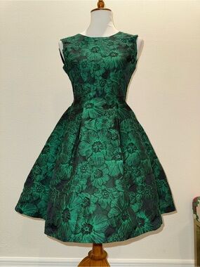 DanMunier fit and flare emerald green jacquard dress.